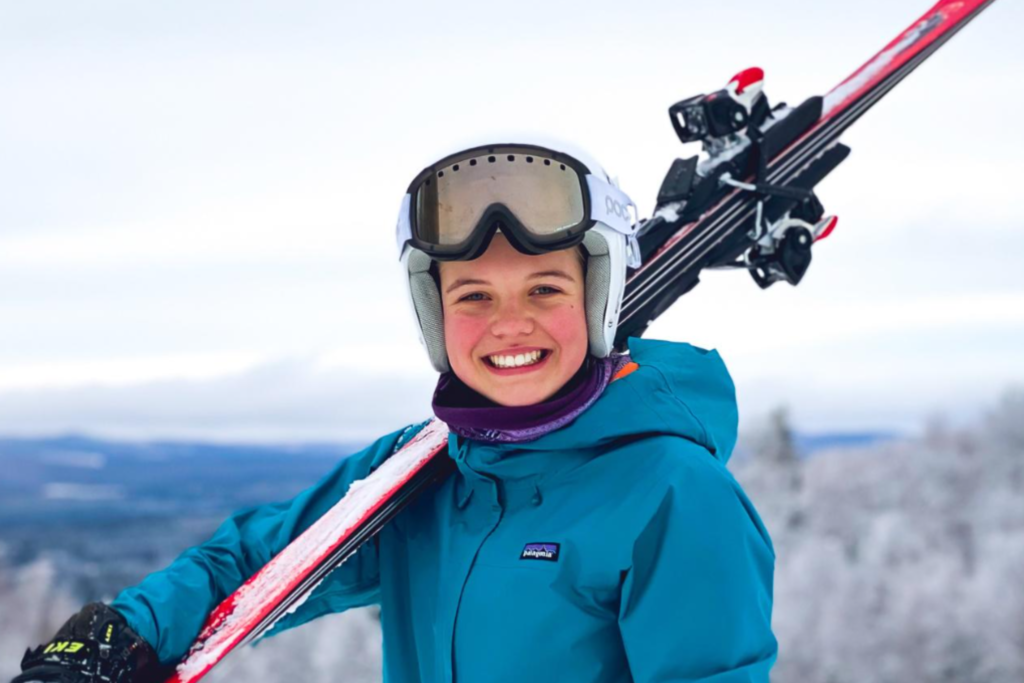 Fredericton Christian Academy student smiling in ski equipment, playing winter sports.