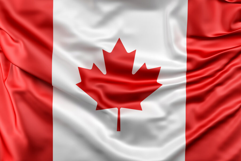 Flag of Canada with red maple leaf representing the union of Canadian provinces.